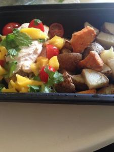 Chicken topped with mango and tomato with a side of roasted potatoes ~Submitted by Jessa